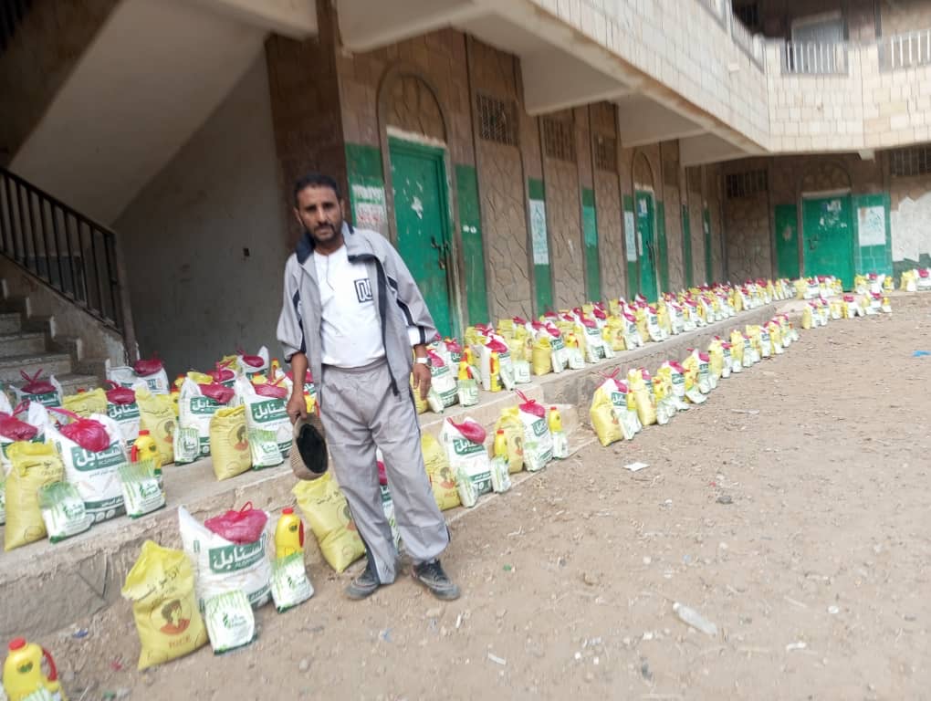 March 2026 Yemen humanitarian relief - Families receiving essential food baskets in Maqbana District