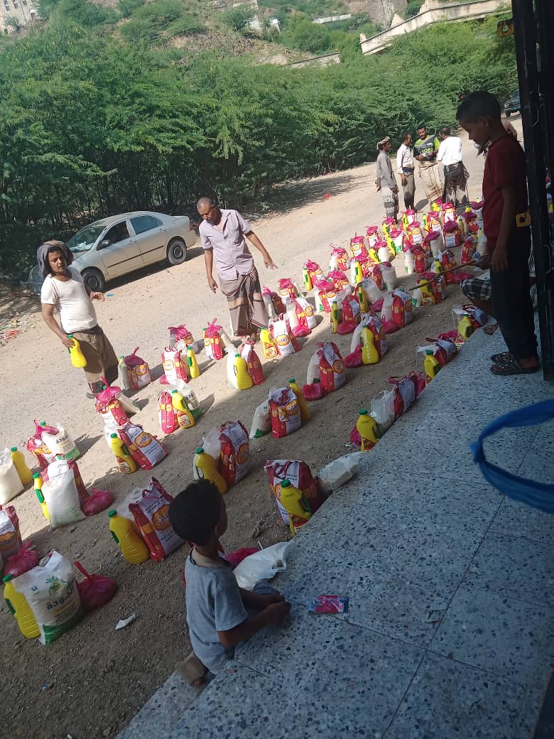 Islamic charity impact - Yemen families receiving essential food supplies and humanitarian relief